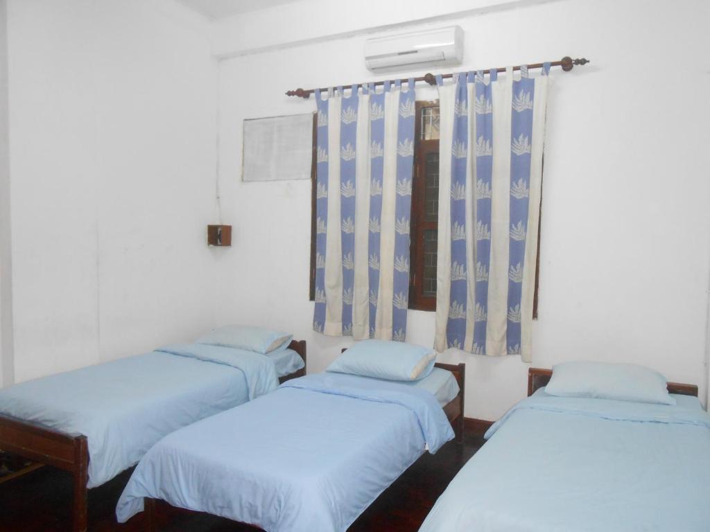 Saysouly Guesthouse Vientiane Quarto foto